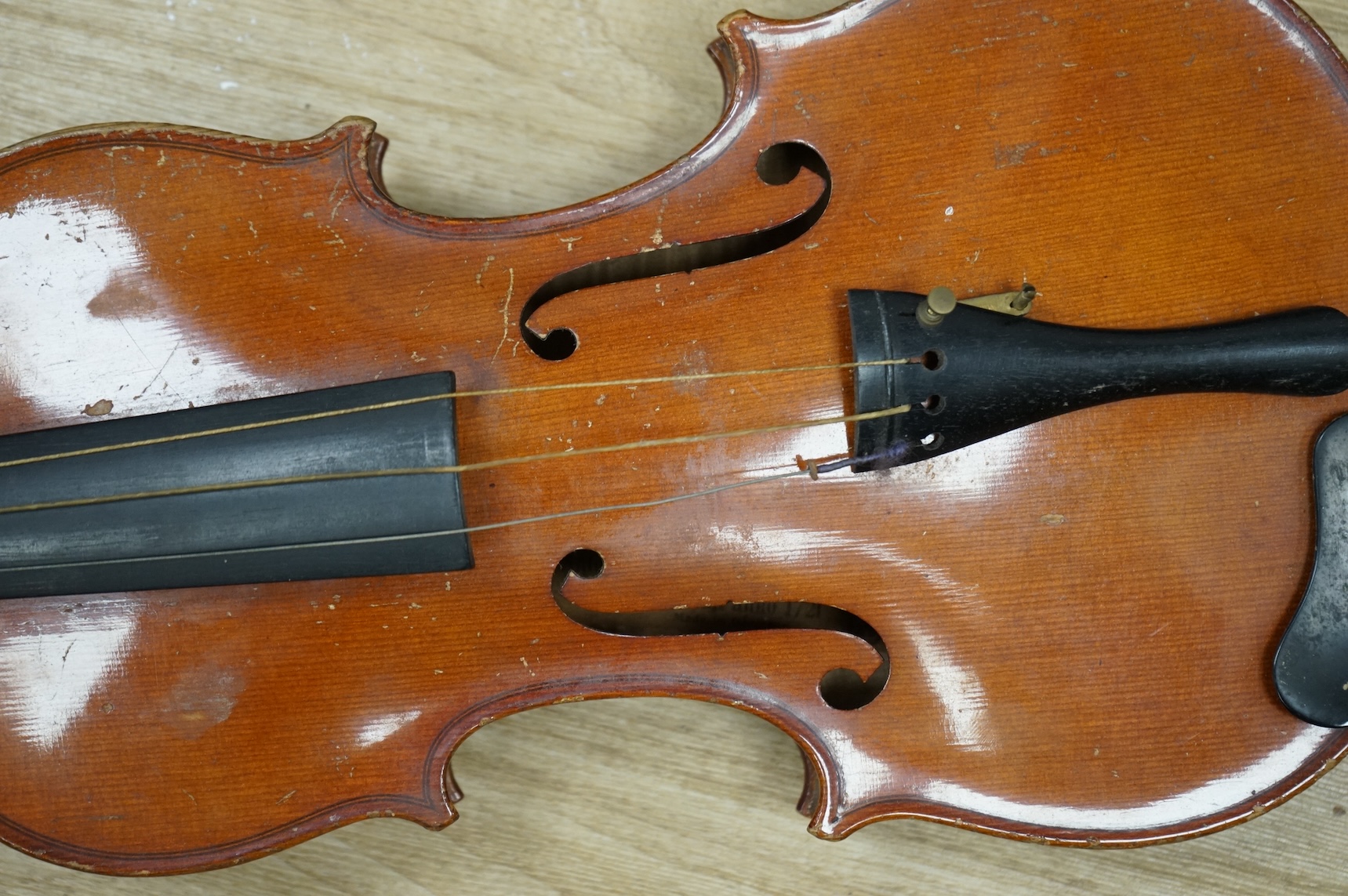 An early 20th century German violin, bearing a Stradivarius label, with case.